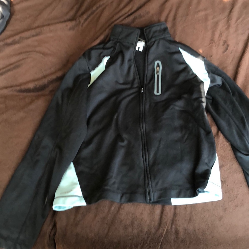Light blue and black zip up jacket